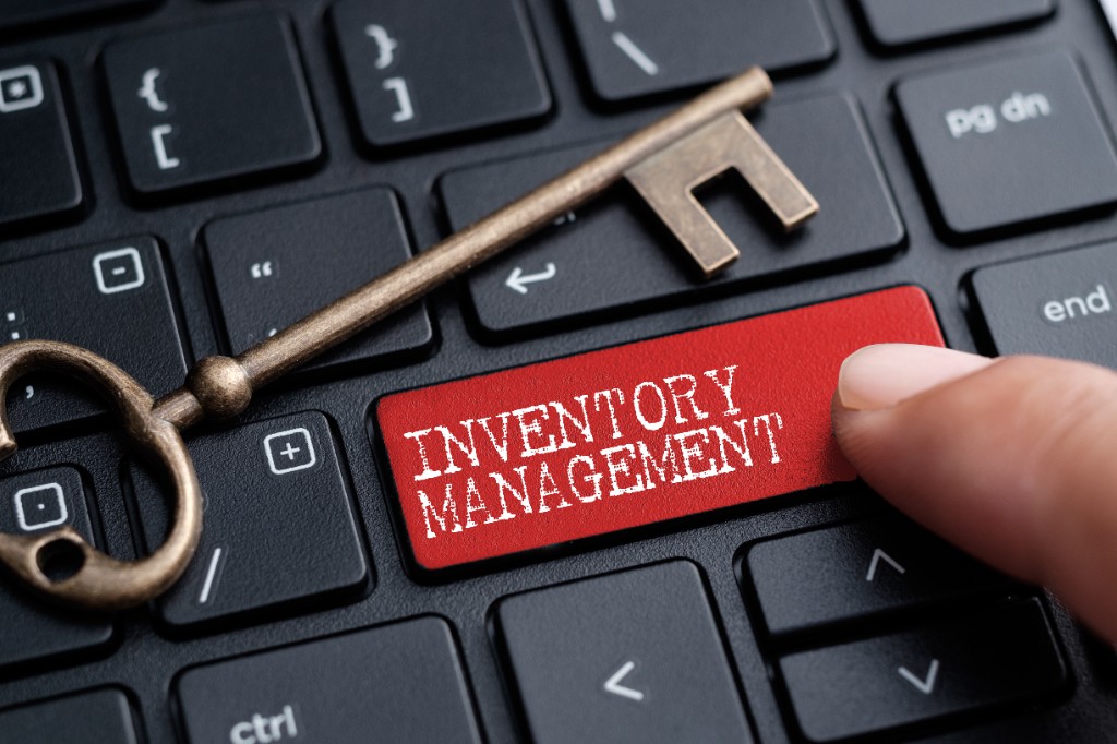 Keyboard with an inventory management key pressed, symbolizing Phoenix Hitech's expertise in excess inventory management